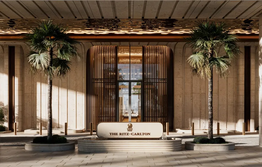 The Ritz-Carlton entrance framed by palms and timber screens