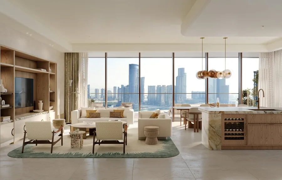 Kitchen and dining space centred on a substantial island at The Ritz-Carlton Residences, Al Maryah Island